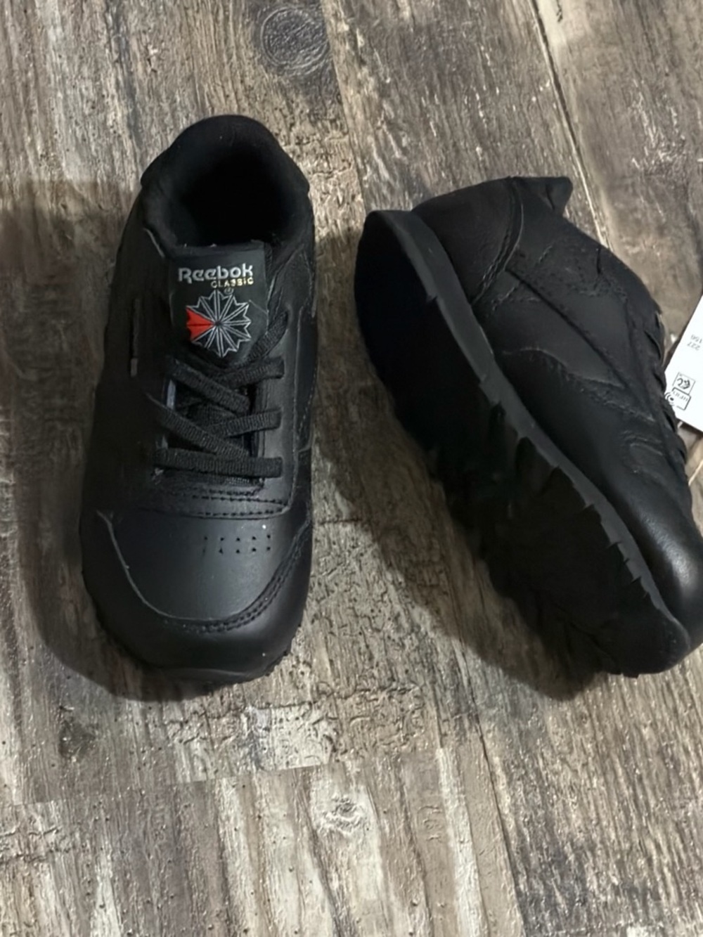 Reebok Kids Black Leather Sneakers with Red Accent